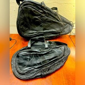 Woman 2 black leather large and small carry all bags with straps and pockets